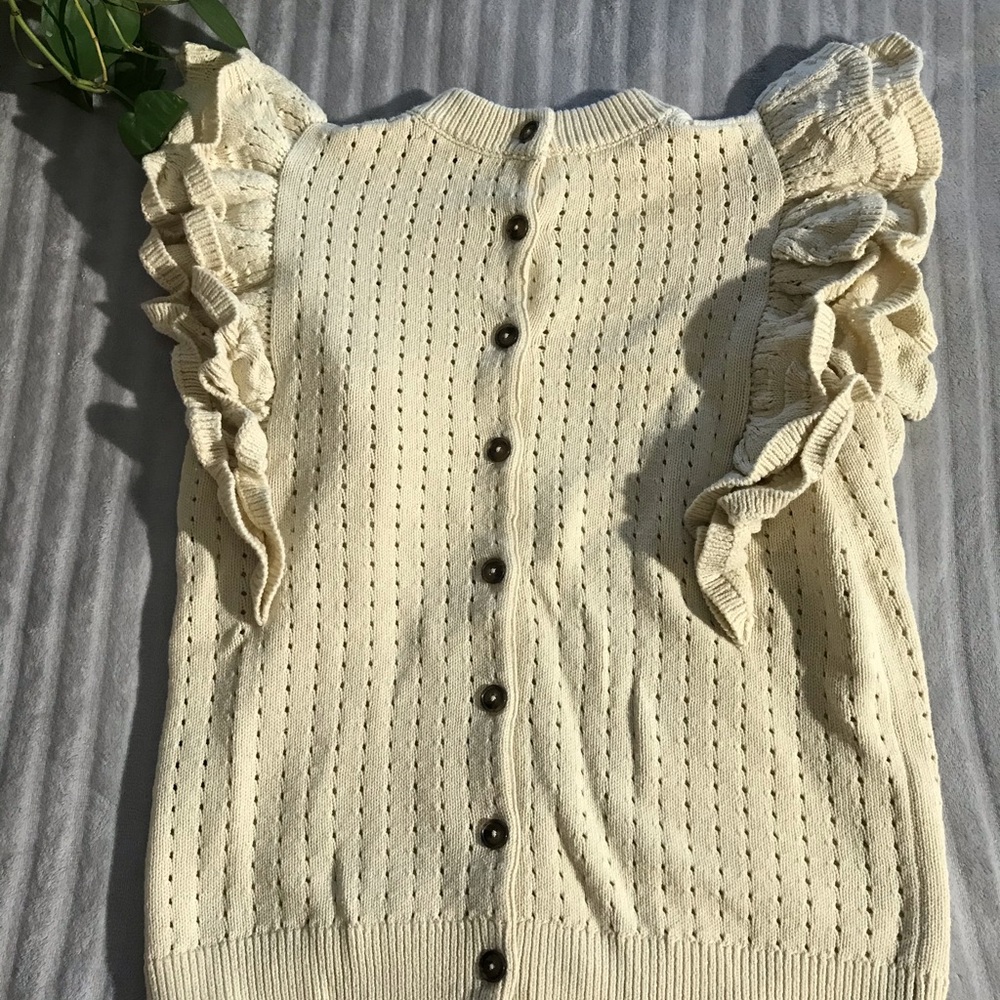 Sweater blouse buttons up the back